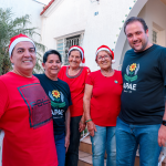 brechó chic especial de natal apae bauru e voluntários em ação